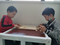 武汉市泓弈青少年棋类体育俱乐部象棋学员对弈瞬间